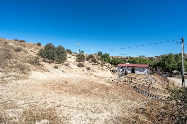16070 Baker Canyon Rd, Canyon Country, CA 91390 - view of yard with an outdoor structure, fence, and an exterior structure