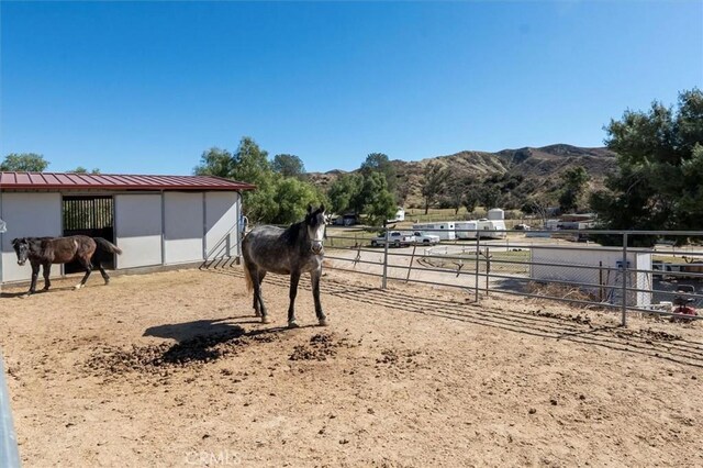 16070 Baker Canyon Rd, Canyon Country, CA 91390 - view of yard featuring a rural view, an exterior structure, a mountain view, and an outdoor structure