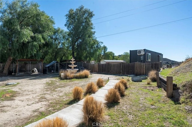 view of yard featuring fence