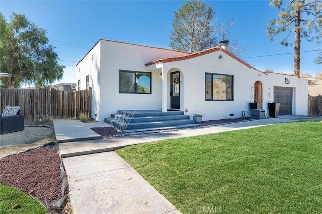 16070 Baker Canyon Rd, Canyon Country, CA 91390 - mediterranean / spanish home with stucco siding, a front lawn, an attached garage, and fence