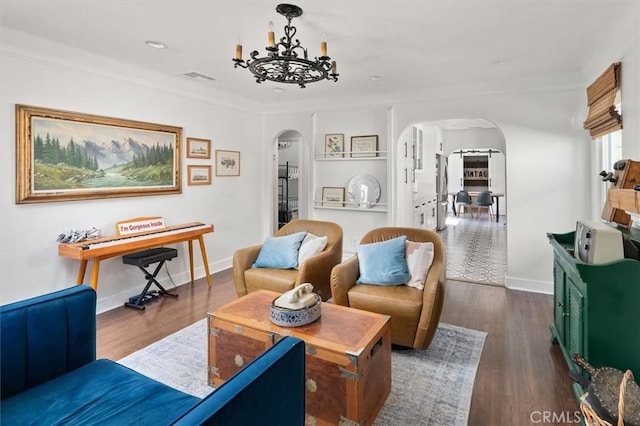 16070 Baker Canyon Rd, Canyon Country, CA 91390 - living area with visible vents, baseboards, arched walkways, a notable chandelier, and dark wood-style flooring