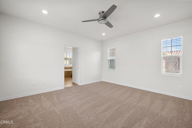 unfurnished bedroom featuring ceiling fan, connected bathroom, recessed lighting, carpet floors, and baseboards