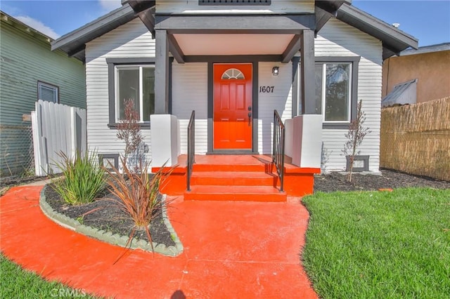 property entrance featuring fence