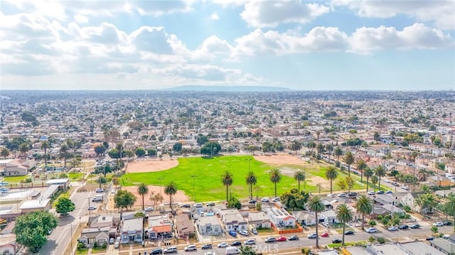 bird's eye view featuring view of golf course and a residential view