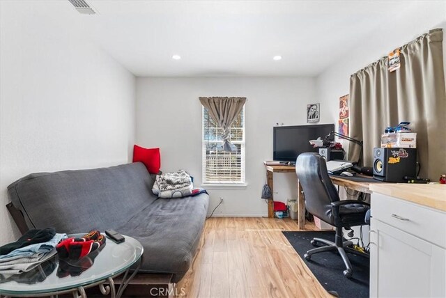 home office with visible vents, wood finished floors, and recessed lighting