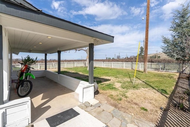 view of yard with a patio area and a fenced backyard