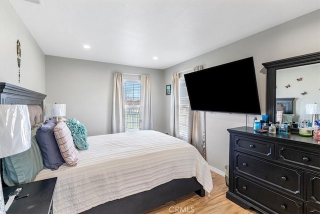 bedroom with light wood-style flooring