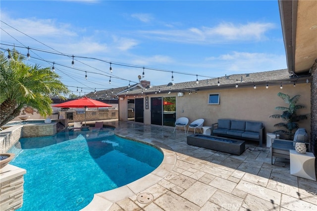 view of pool with a patio area, outdoor lounge area, fence, and a pool with connected hot tub