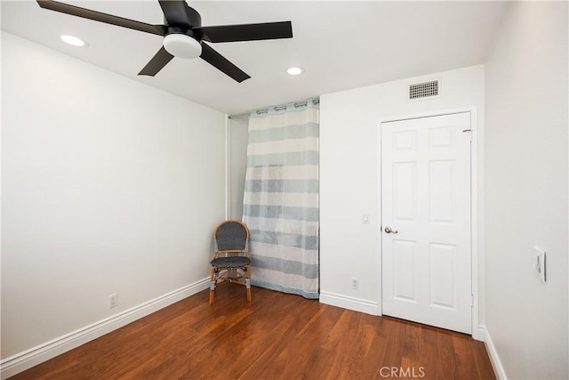 unfurnished room featuring recessed lighting, visible vents, baseboards, and wood finished floors