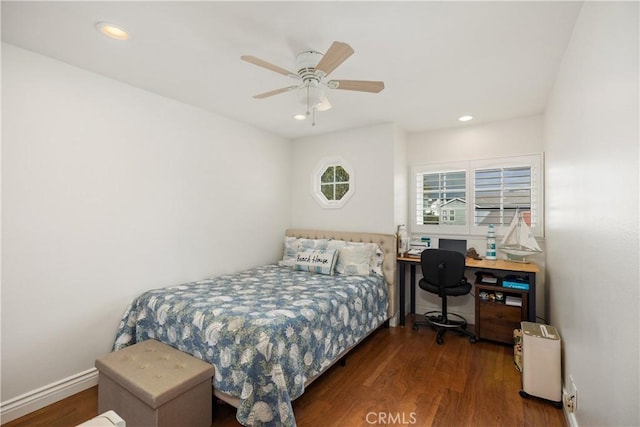 bedroom featuring a ceiling fan, recessed lighting, baseboards, and wood finished floors