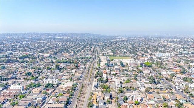 birds eye view of property with a residential view