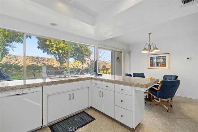 kitchen featuring white cabinetry, white dishwasher, visible vents, and a sink