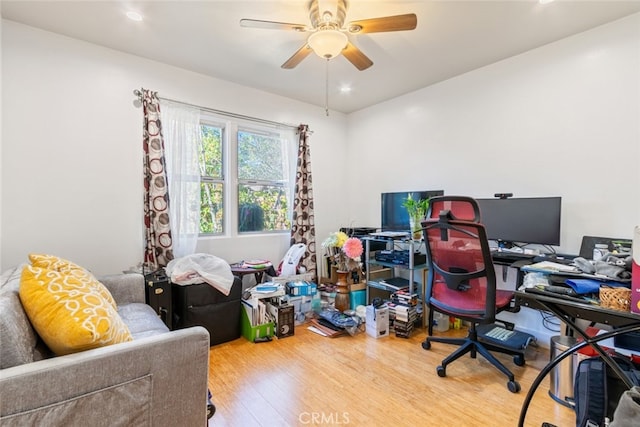 home office featuring ceiling fan and wood finished floors