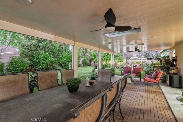 exterior space featuring outdoor dining space, a patio, and ceiling fan