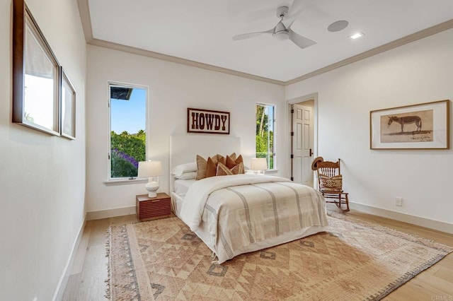 7102 Via De Maya, Rancho Santa Fe, CA 92067 - bedroom featuring crown molding, light wood-type flooring, baseboards, and a ceiling fan