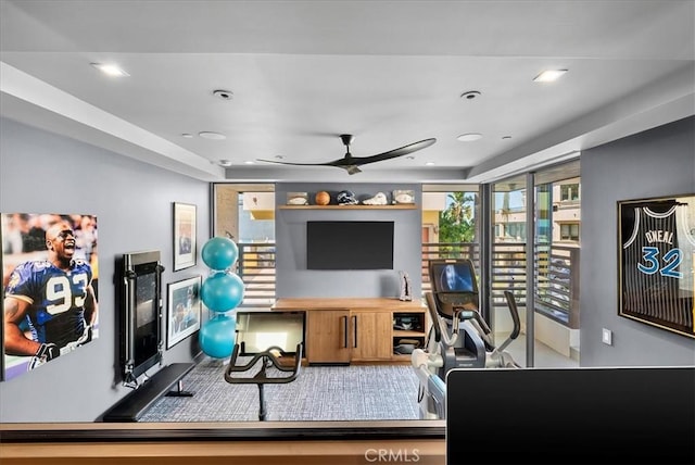 workout room featuring a ceiling fan and recessed lighting