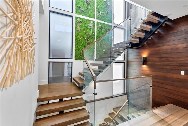 staircase featuring wood finished floors