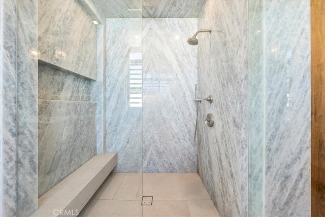 full bath with tile patterned floors and a walk in shower