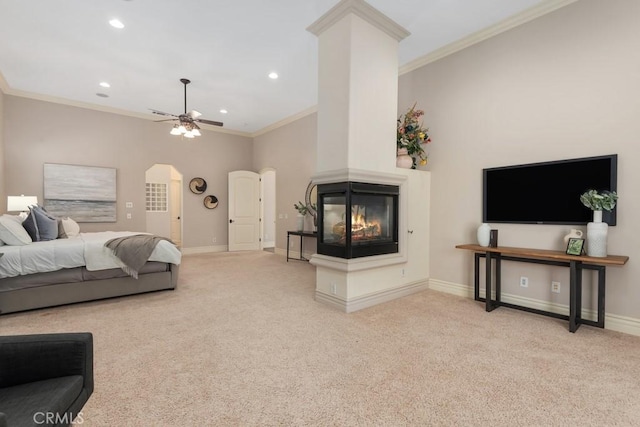 bedroom with ornamental molding, carpet, and baseboards