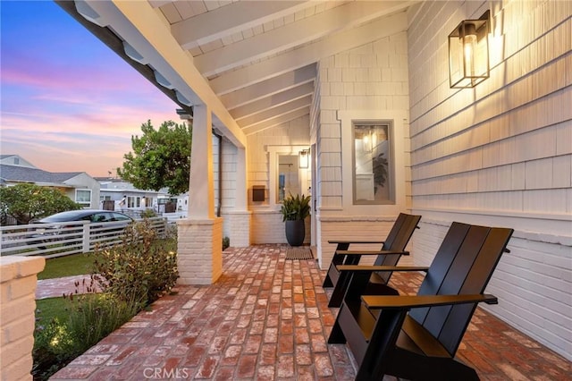 patio terrace at dusk with fence