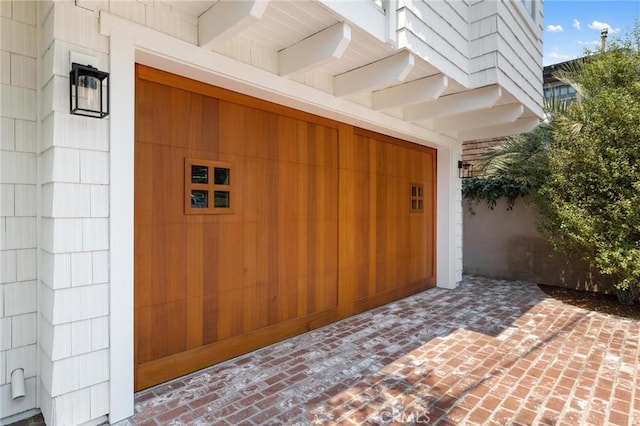 property entrance with a garage