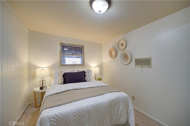 carpeted bedroom with baseboards