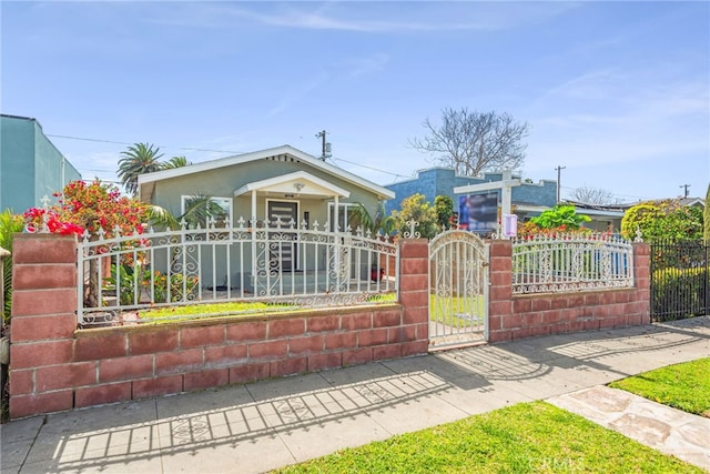 view of front of house with a gate and a fenced front yard