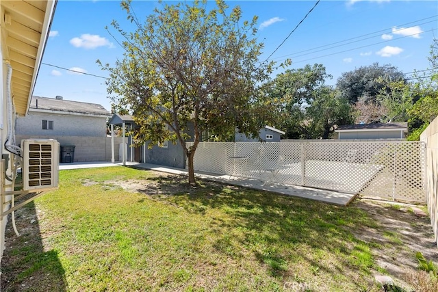 view of yard with a fenced backyard and a patio