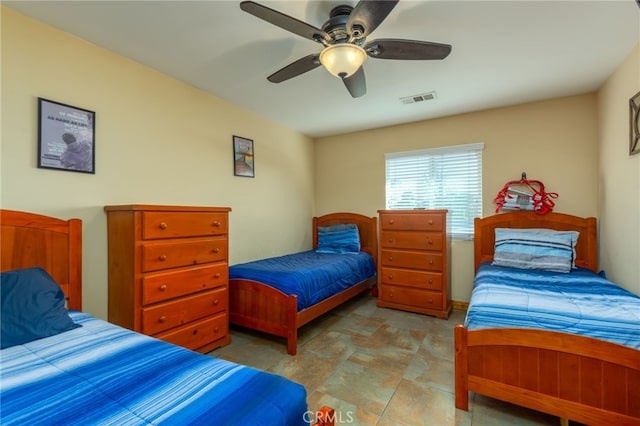 bedroom featuring visible vents and ceiling fan