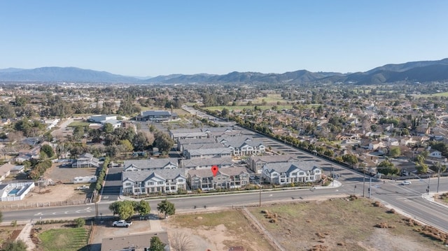 drone / aerial view featuring a residential view and a mountain view