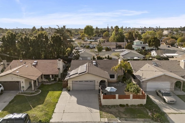 birds eye view of property with a residential view