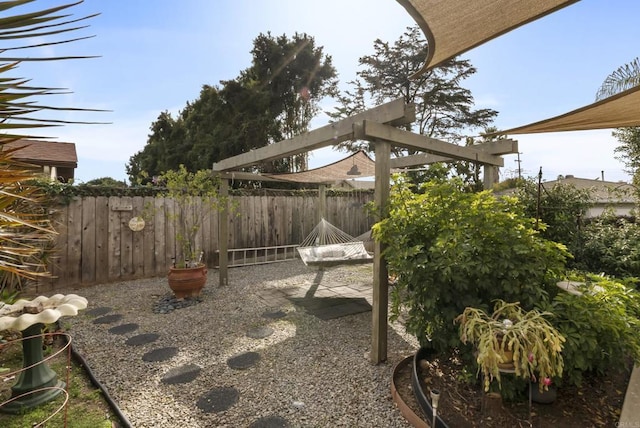 view of yard featuring a patio and fence