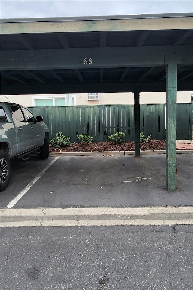 23230 Orange Ave Unit 2, Lake Forest, CA 92630 - covered parking lot featuring fence