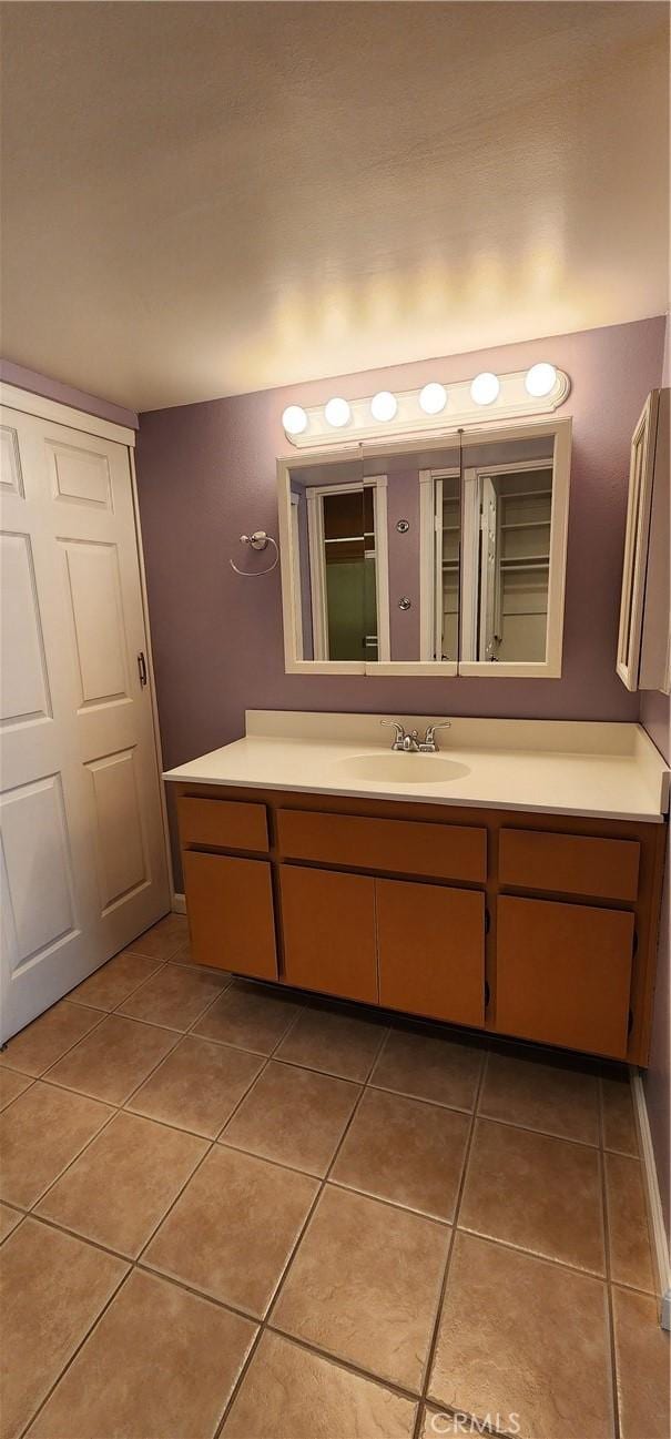 bathroom featuring vanity and tile patterned floors