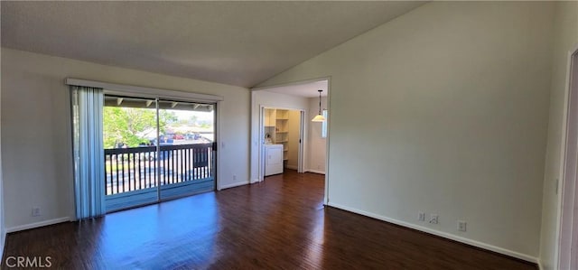 23230 Orange Ave Unit 2, Lake Forest, CA 92630 - spare room with lofted ceiling, dark wood-style floors, baseboards, and washer / dryer