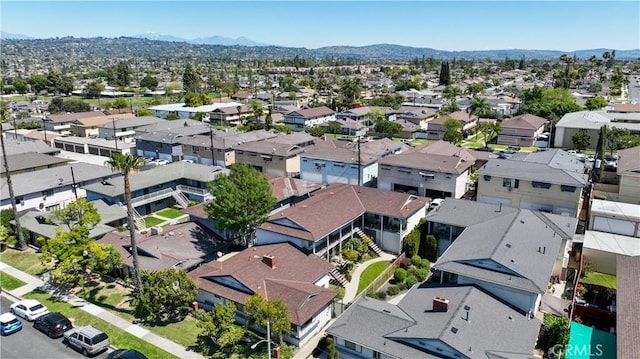 bird's eye view featuring a mountain view and a residential view