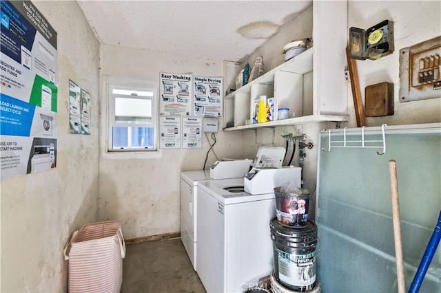 laundry area featuring laundry area and washer and clothes dryer