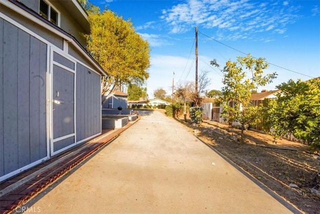 exterior space featuring a patio area and fence