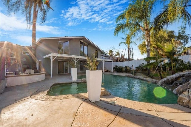 view of swimming pool featuring a patio area, a fenced backyard, and a fenced in pool