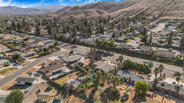 bird's eye view with a residential view and a mountain view