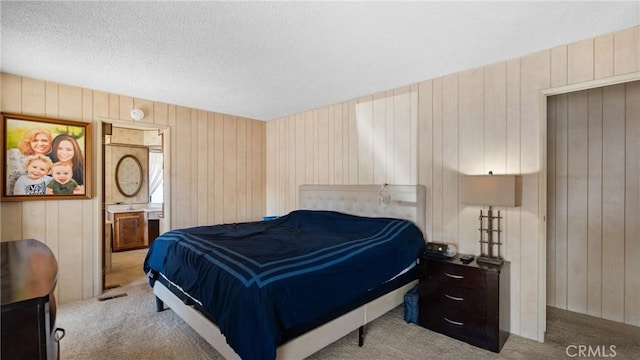 bedroom featuring light carpet and visible vents