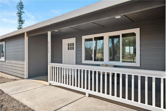 doorway to property with covered porch