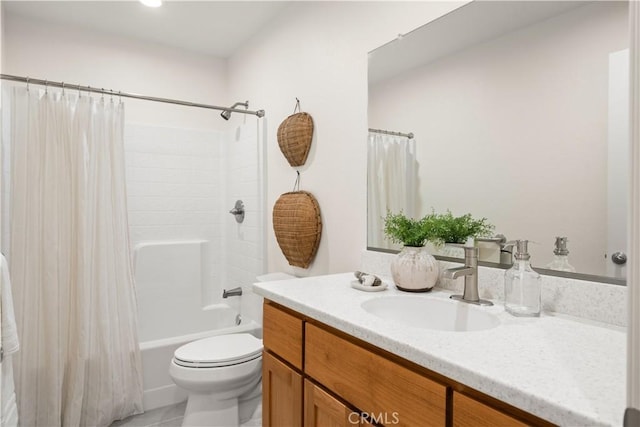 full bathroom featuring toilet, shower / tub combo with curtain, and vanity