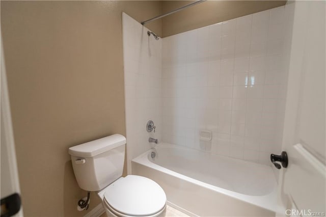 bathroom featuring shower / bathing tub combination and toilet