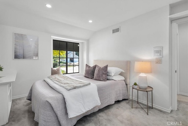 carpeted bedroom with visible vents, recessed lighting, vaulted ceiling, and baseboards