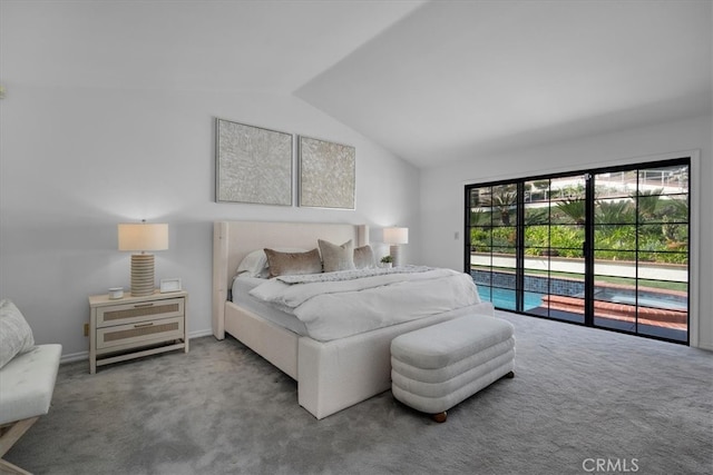 carpeted bedroom featuring access to outside and vaulted ceiling