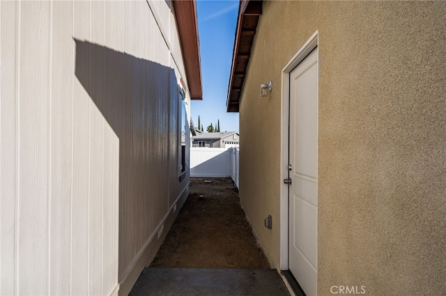 view of property exterior featuring fence