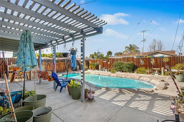 view of swimming pool featuring a patio, a fenced backyard, a fenced in pool, and a pergola