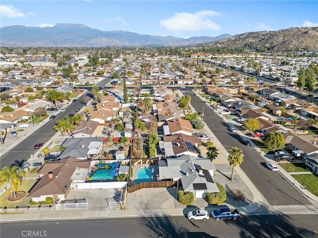 drone / aerial view with a residential view and a mountain view