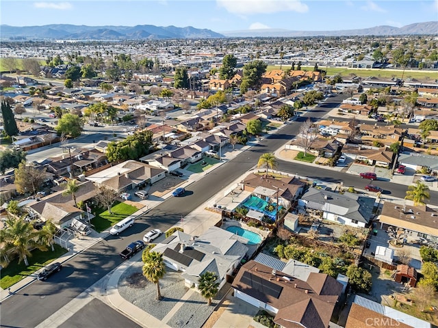 drone / aerial view with a residential view and a mountain view